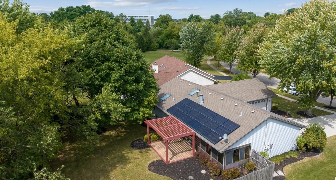 3442 North Trainer Road Rockford, IL 61114 - Photo 35 of 35 an aerial view of a house with swimming pool and a yard