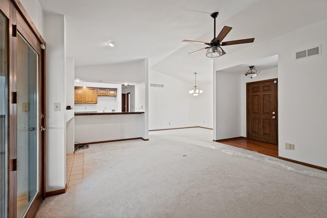 3442 North Trainer Road Rockford, IL 61114 - Photo 5 of 35 a view of a livingroom with a ceiling fan and window