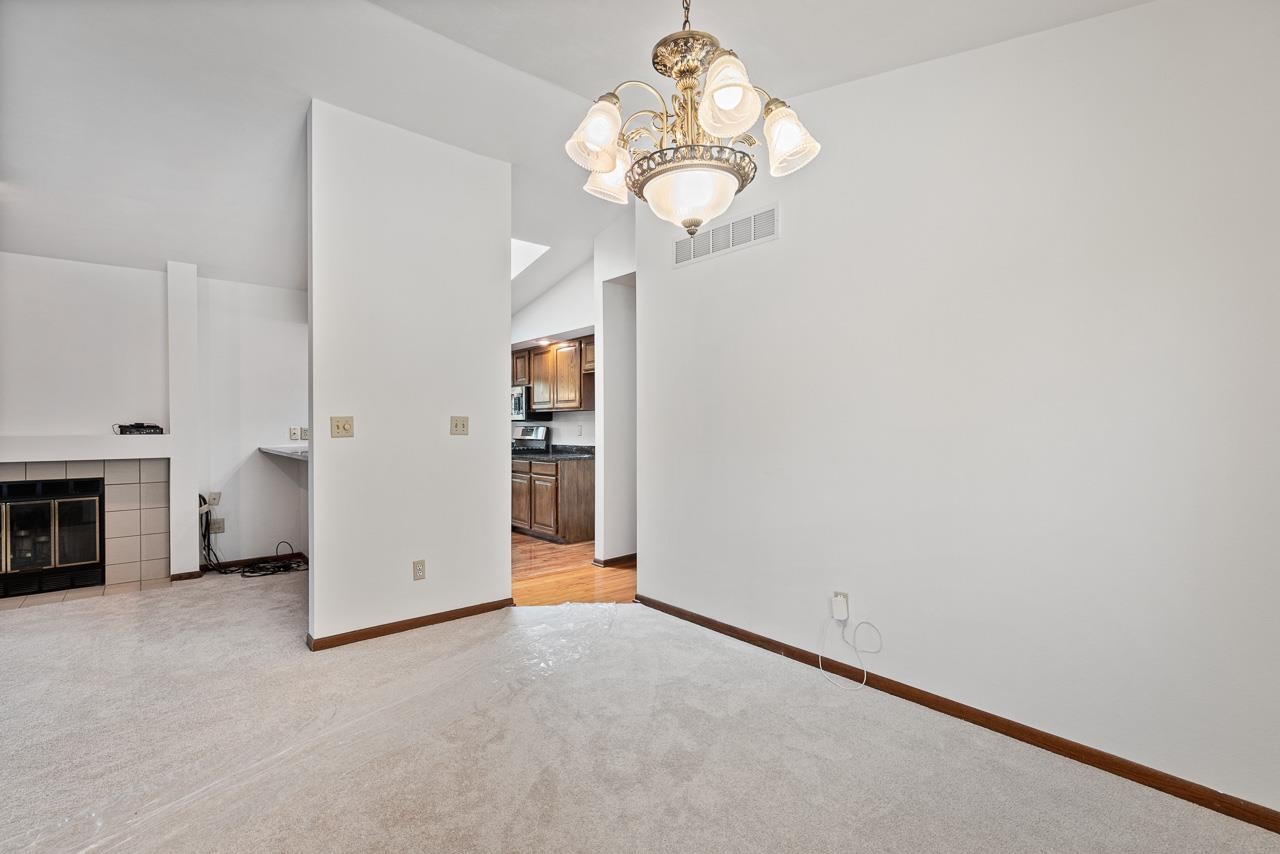 3442 North Trainer Road Rockford, IL 61114 - Photo 8 of 35 a view of a chandelier in a room