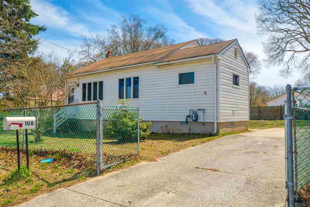 108 Avalon Road Cape May, NJ 08204 - Photo 1 of 1 a view of a house with backyard and sitting area