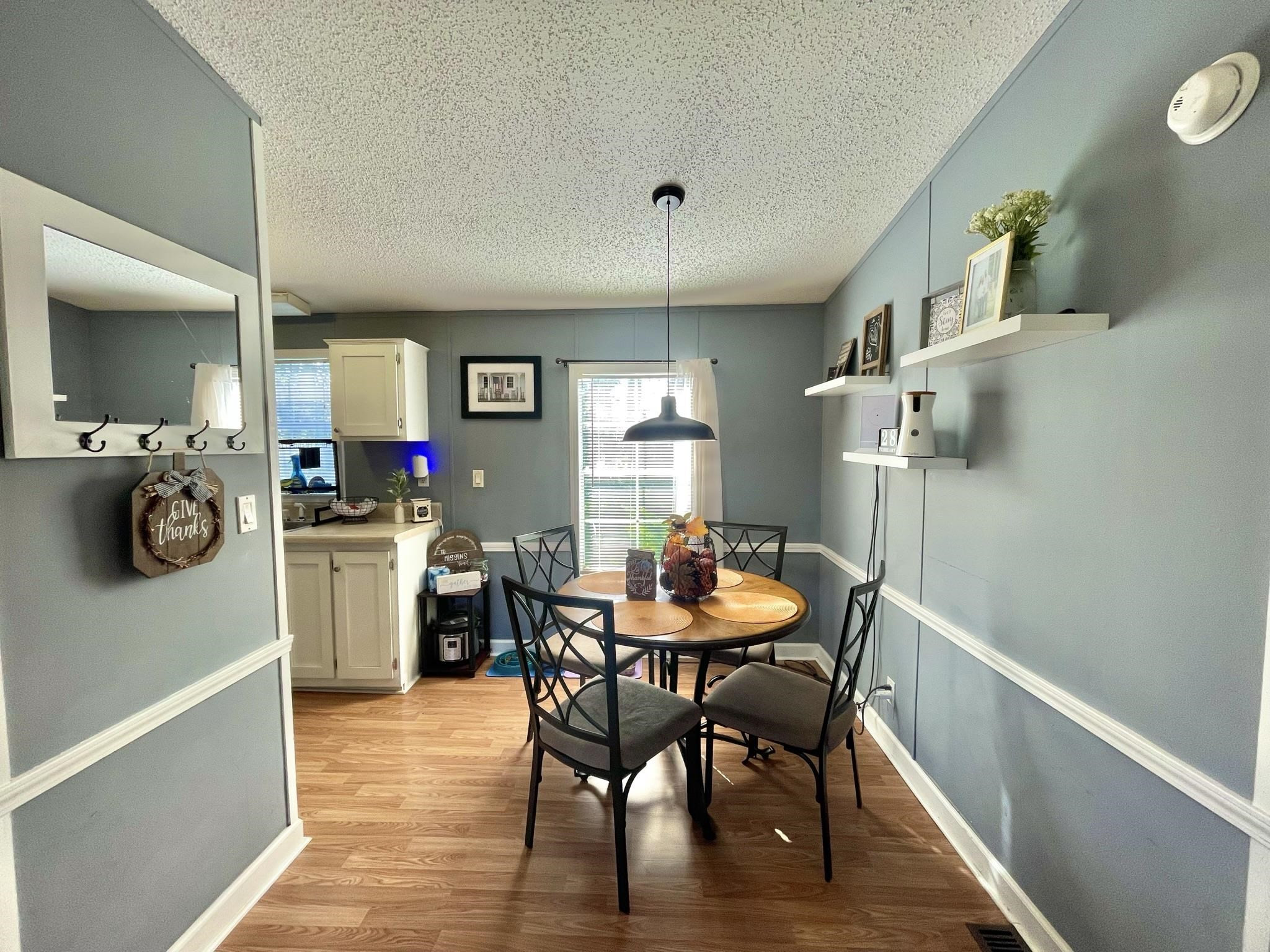 2433 Shiloh Church Road Roxboro, NC 27574 - Photo 5 of 26 a dining room with furniture and window