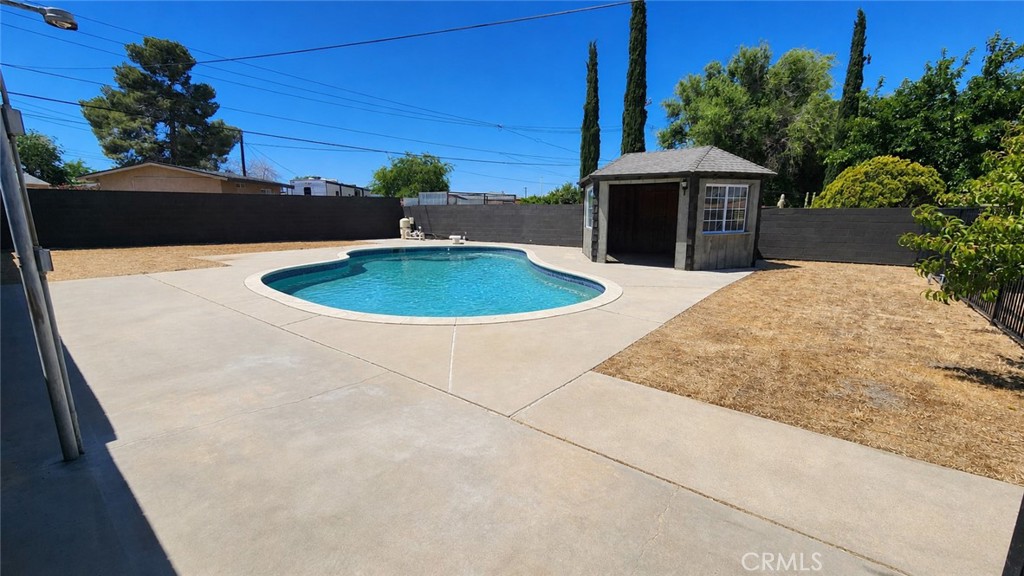 38859 Mesquite Road Palmdale, CA 93551 - Photo 26 of 27 back yard 3 (pool was virtually filled)