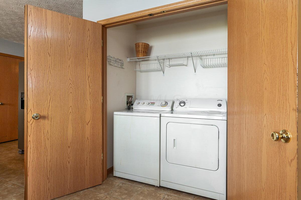 77 Beech Court Delaware, OH 43015 - Photo 14 of 34 first floor laundry