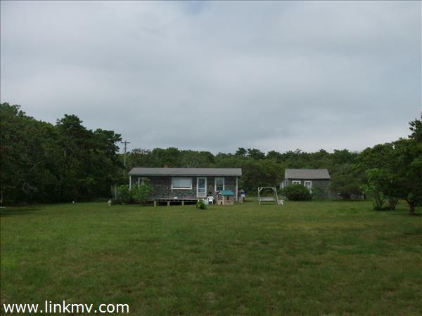 11 Quammox Road Edgartown, MA 02539 - Photo 1 of 2 a view of a house with a big yard