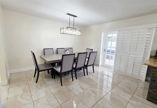 a view of a dining room with furniture