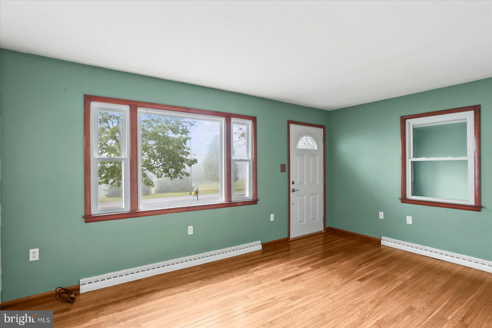 1384 Hunterstown Road Gettysburg, PA 17325 - Photo 11 of 37 a view of empty room with window and wooden floor