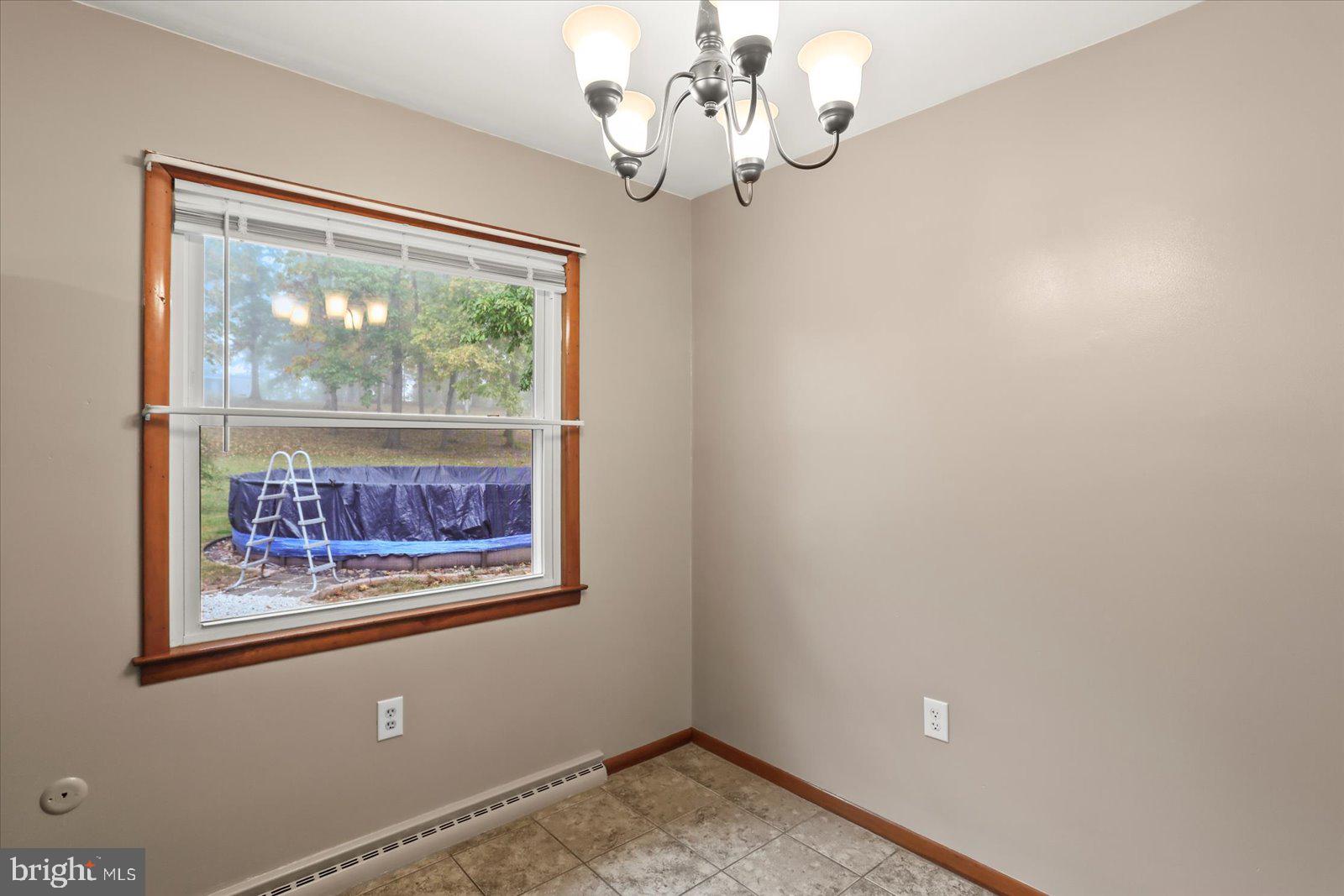 1384 Hunterstown Road Gettysburg, PA 17325 - Photo 17 of 37 en view of a room with a large window