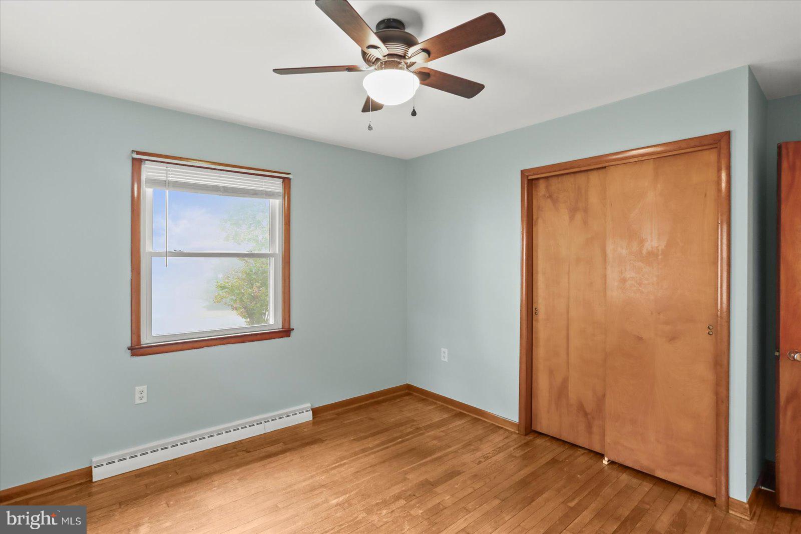 1384 Hunterstown Road Gettysburg, PA 17325 - Photo 23 of 37 a view of an empty room with a window and a ceiling fan