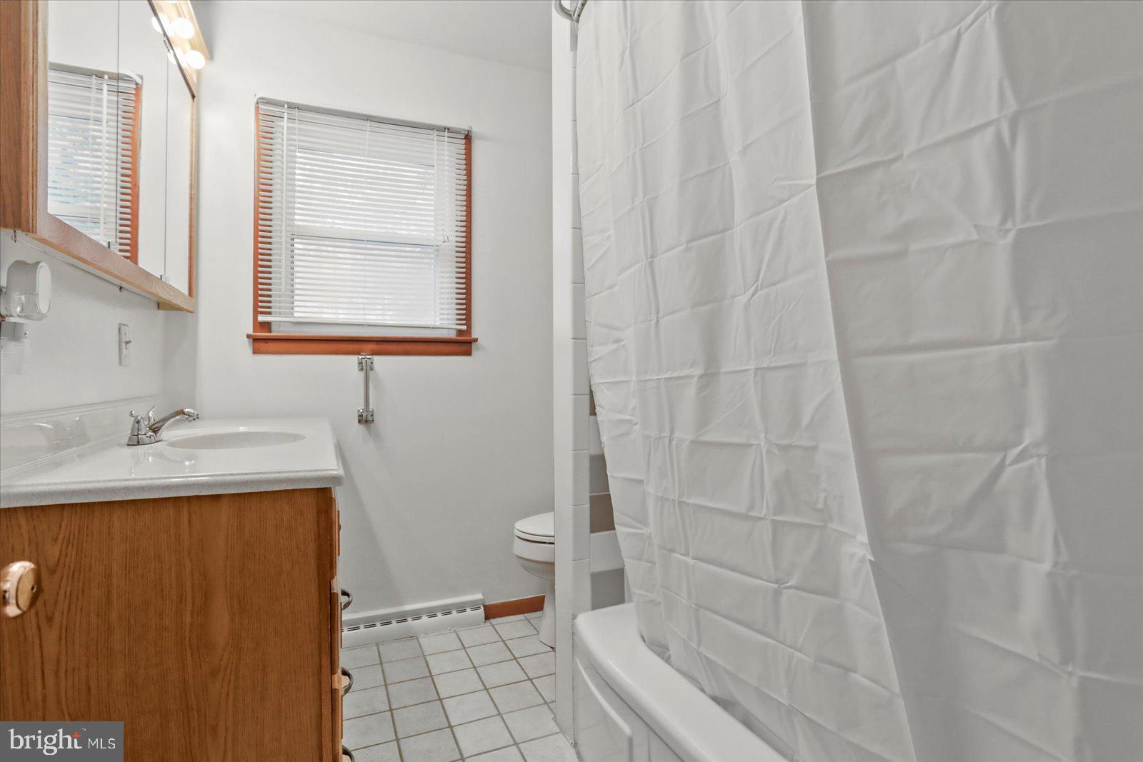 1384 Hunterstown Road Gettysburg, PA 17325 - Photo 26 of 37 a bathroom with a sink toilet and shower