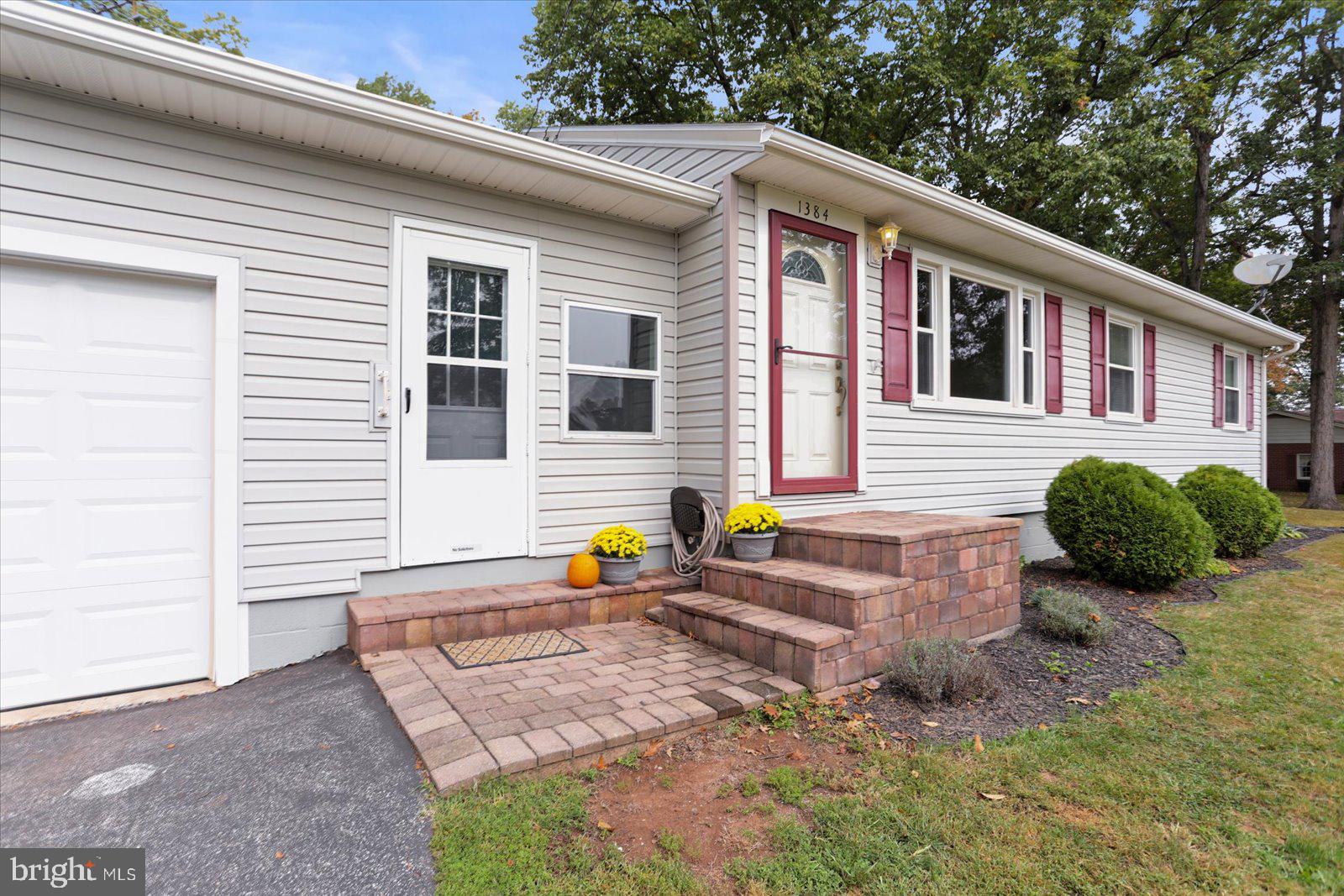 1384 Hunterstown Road Gettysburg, PA 17325 - Photo 6 of 37 a front view of a house with outdoor seating