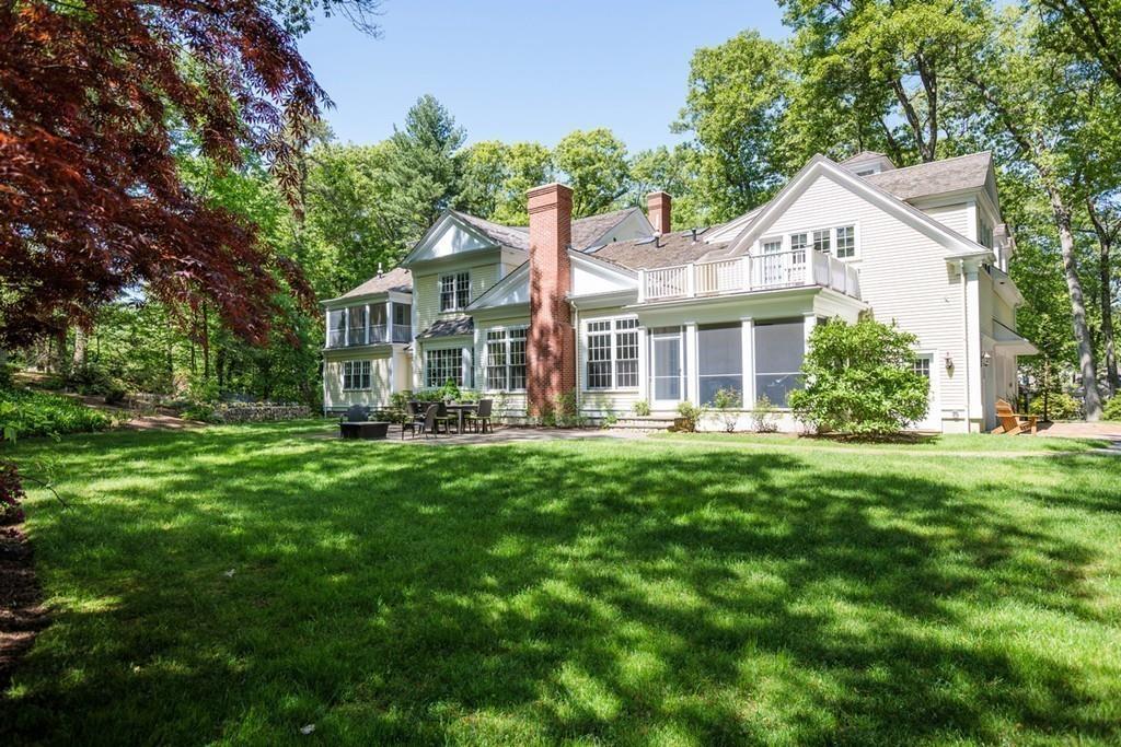 190 Winding River Road Wellesley, MA 02482 - Photo 17 of 18 a front view of a house with a yard
