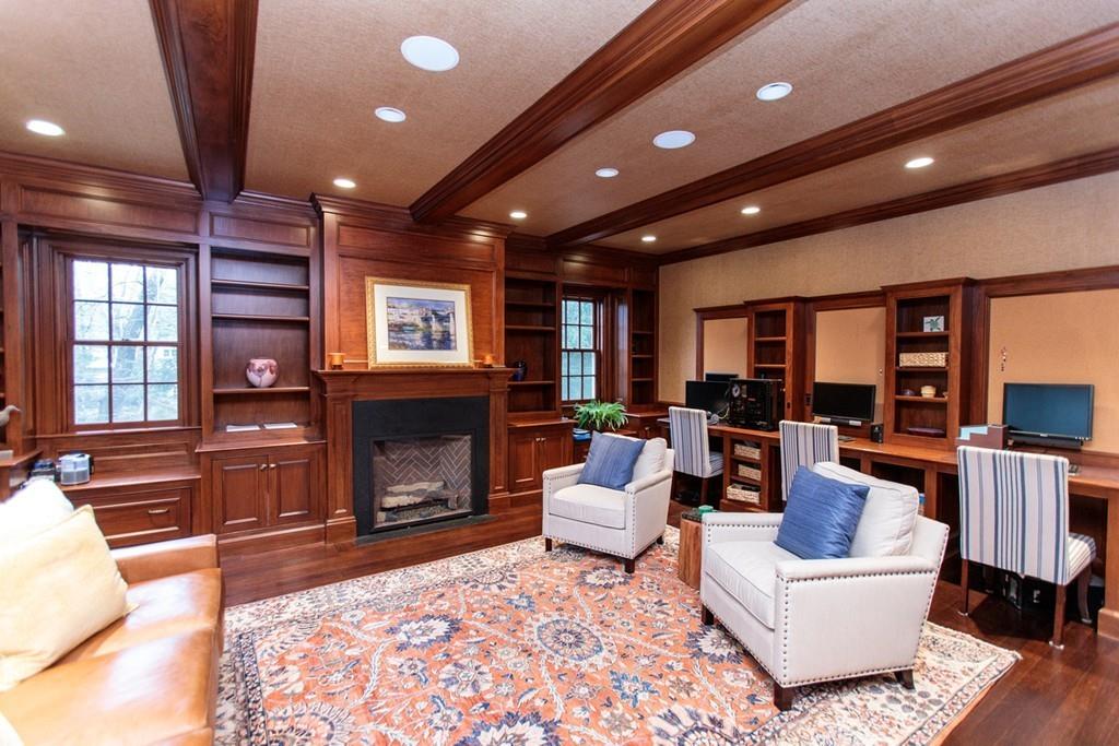 190 Winding River Road Wellesley, MA 02482 - Photo 6 of 18 a living room with furniture and a fireplace