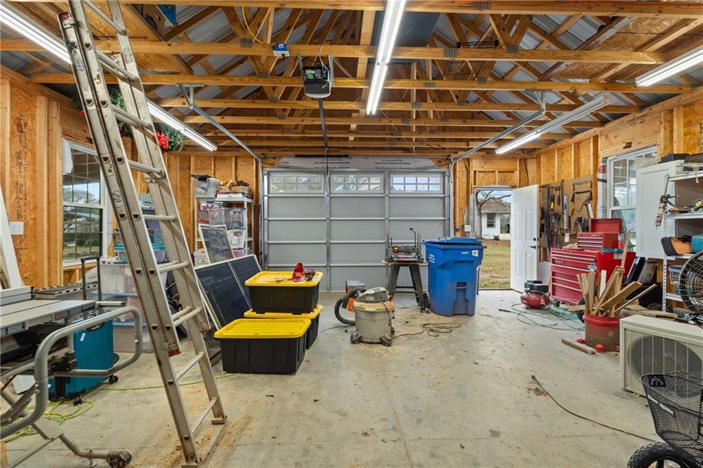 4535 South Barnett Shoals Road Athens, GA 30605 - Photo 40 of 60 a view of a storage room with a lot of stuff