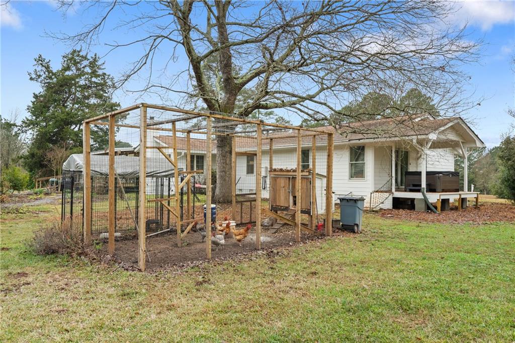 4535 South Barnett Shoals Road Athens, GA 30605 - Photo 47 of 60 a view of a house with a yard
