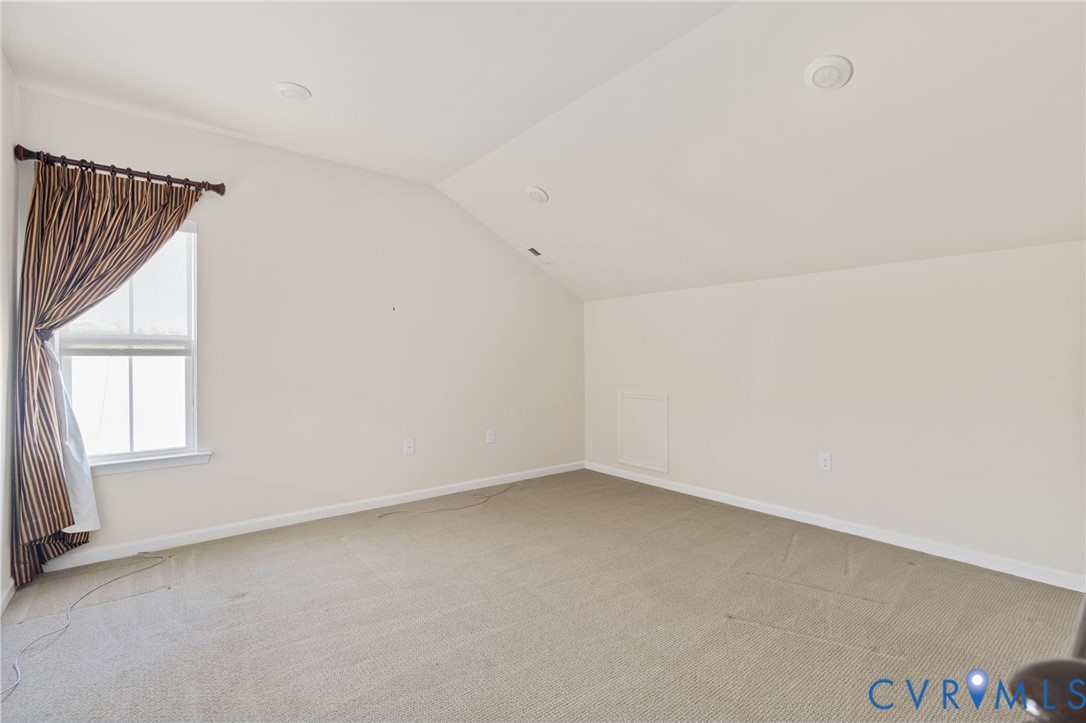 1201 Westwood Village Lane, Unit 402 Midlothian, VA 23114 - Photo 22 of 27 an empty room with a window