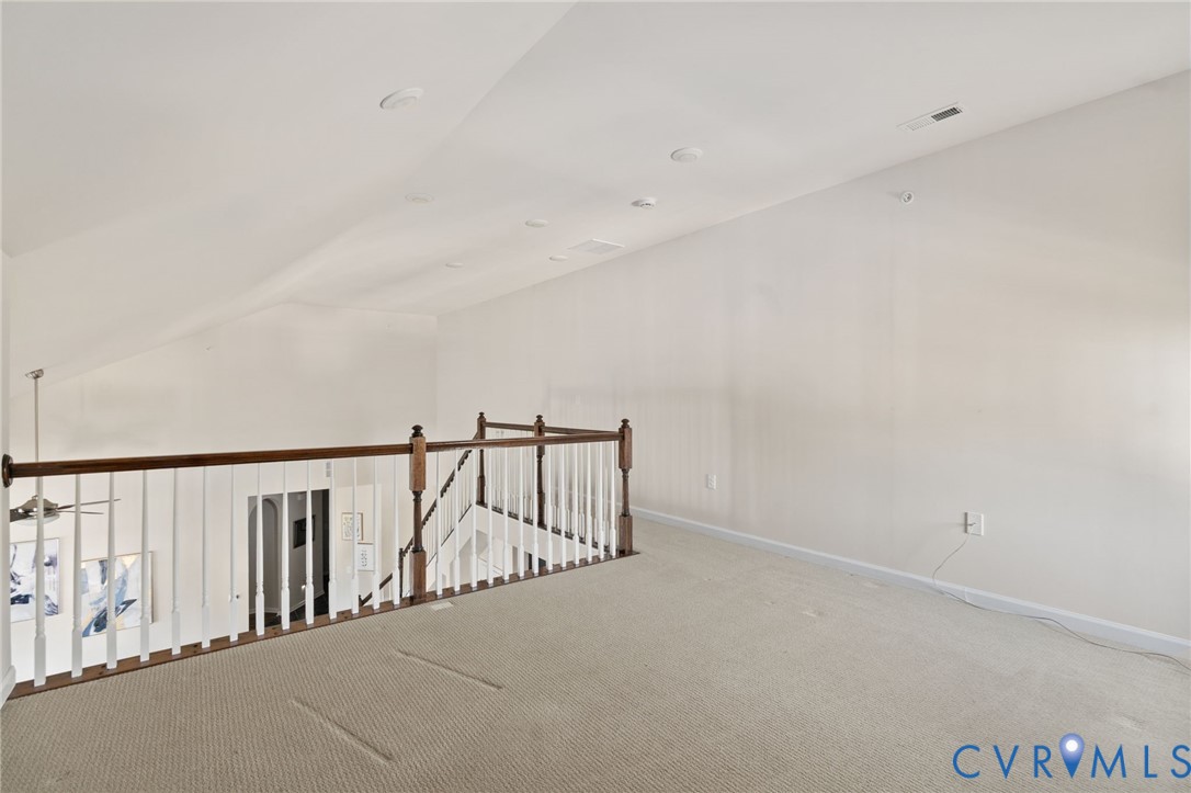 1201 Westwood Village Lane, Unit 402 Midlothian, VA 23114 - Photo 23 of 27 a view of staircase with white walls