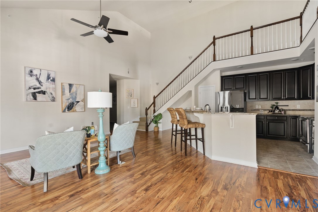 1201 Westwood Village Lane, Unit 402 Midlothian, VA 23114 - Photo 9 of 27 a view of kitchen with furniture and wooden floor