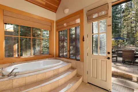 a view of a bedroom with a large window