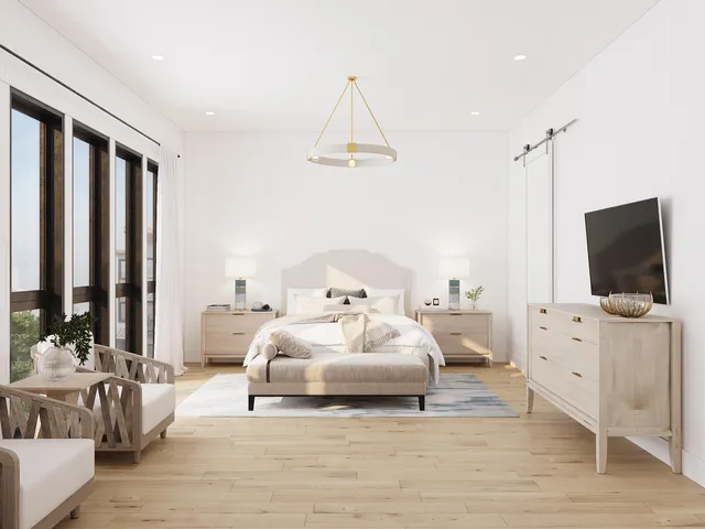 a bedroom with bed and large windows