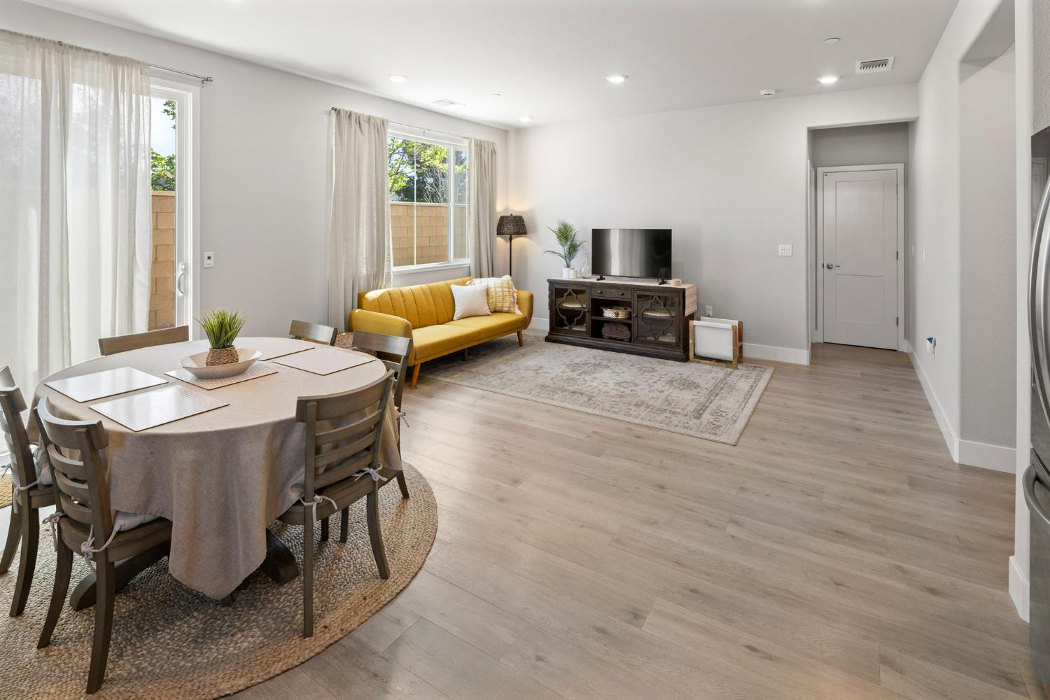 1508 Westwind Way Rocklin, CA 95765 - Photo 15 of 45 a view of a dining room with furniture and a window