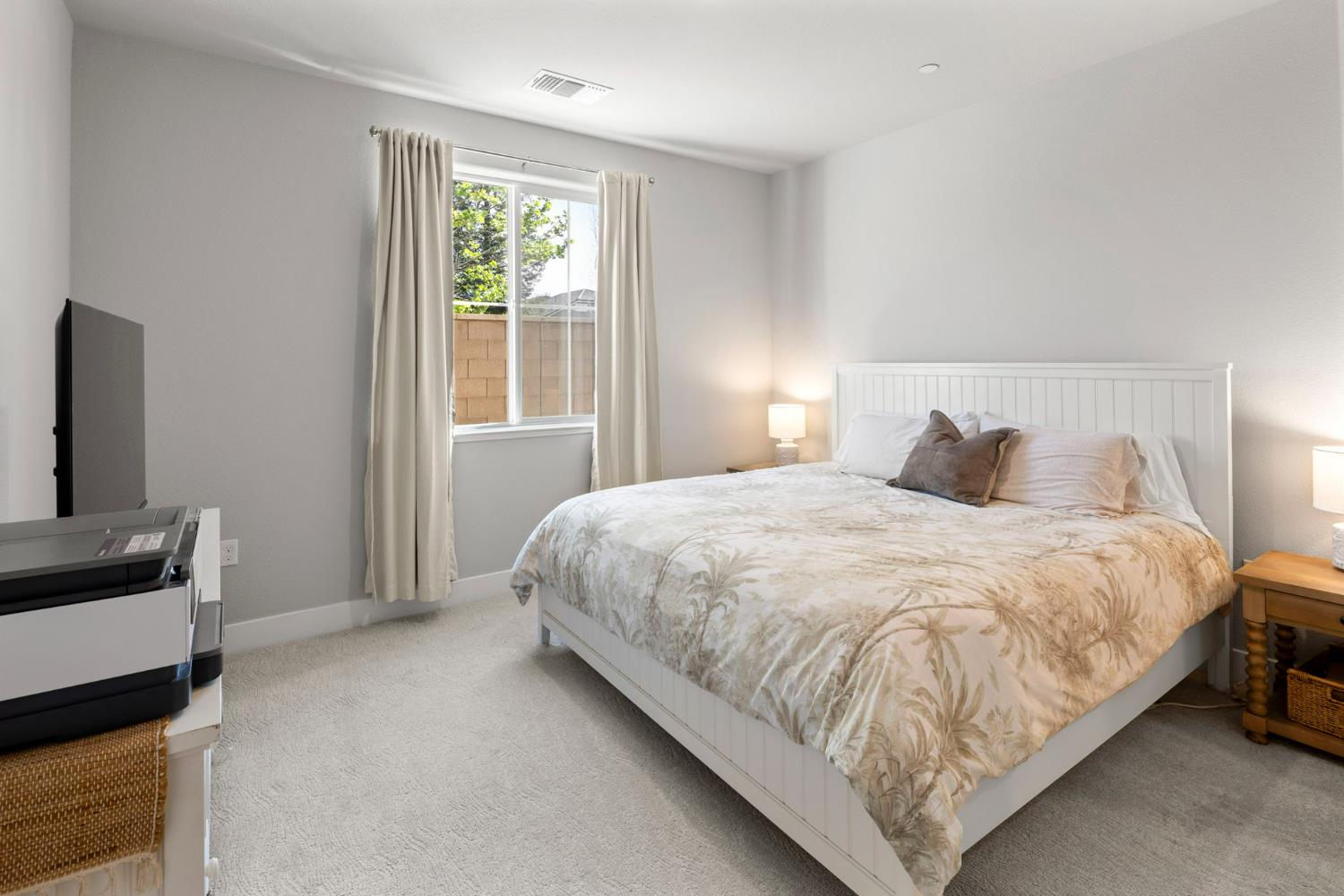 1508 Westwind Way Rocklin, CA 95765 - Photo 17 of 45 a bedroom with a bed and a window