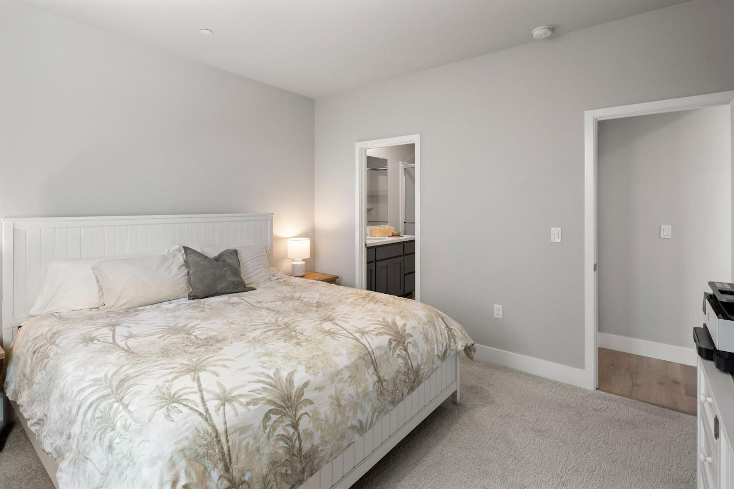 1508 Westwind Way Rocklin, CA 95765 - Photo 19 of 45 a large bed sitting in a bedroom and closet
