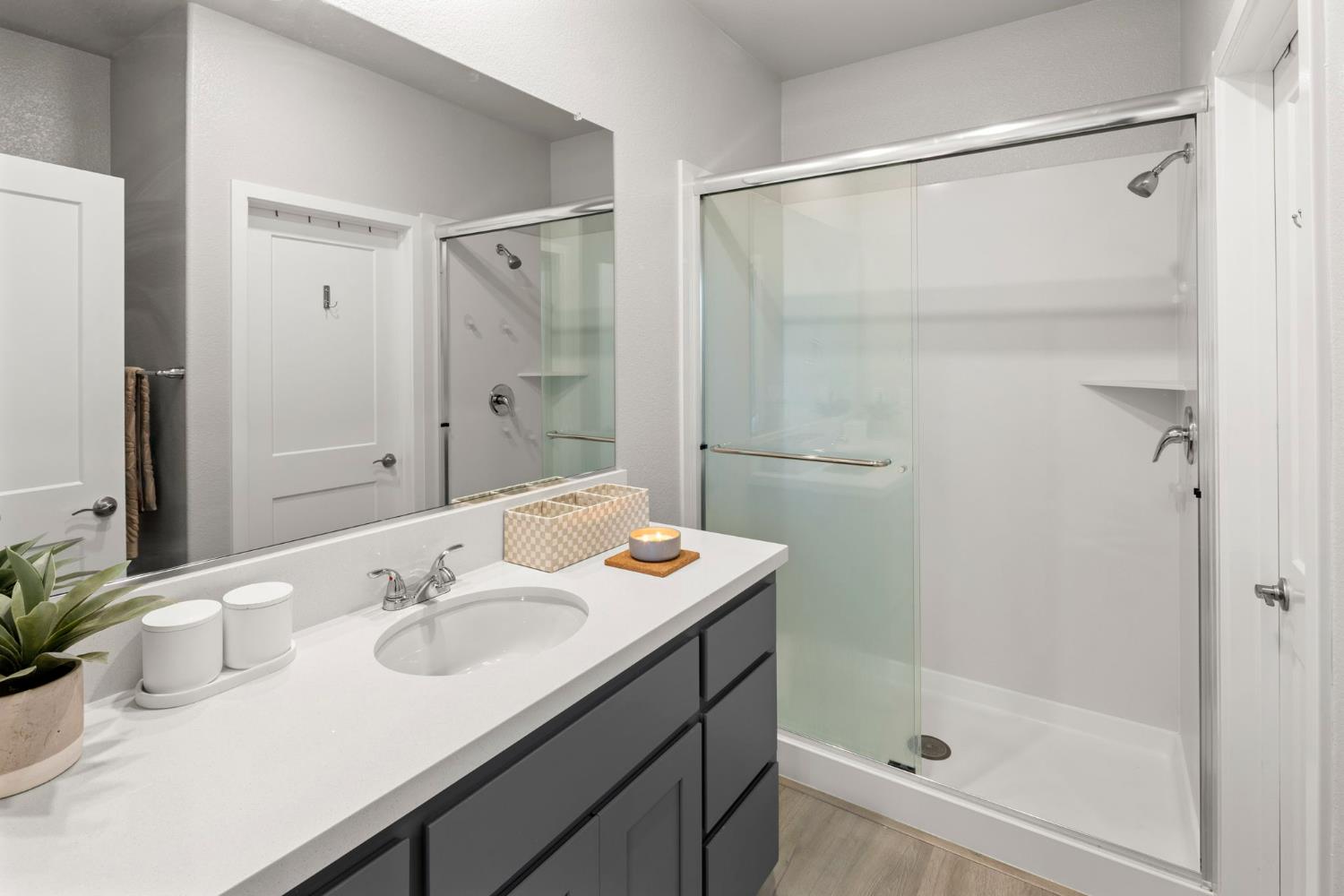 1508 Westwind Way Rocklin, CA 95765 - Photo 20 of 45 a bathroom with a sink and a mirror