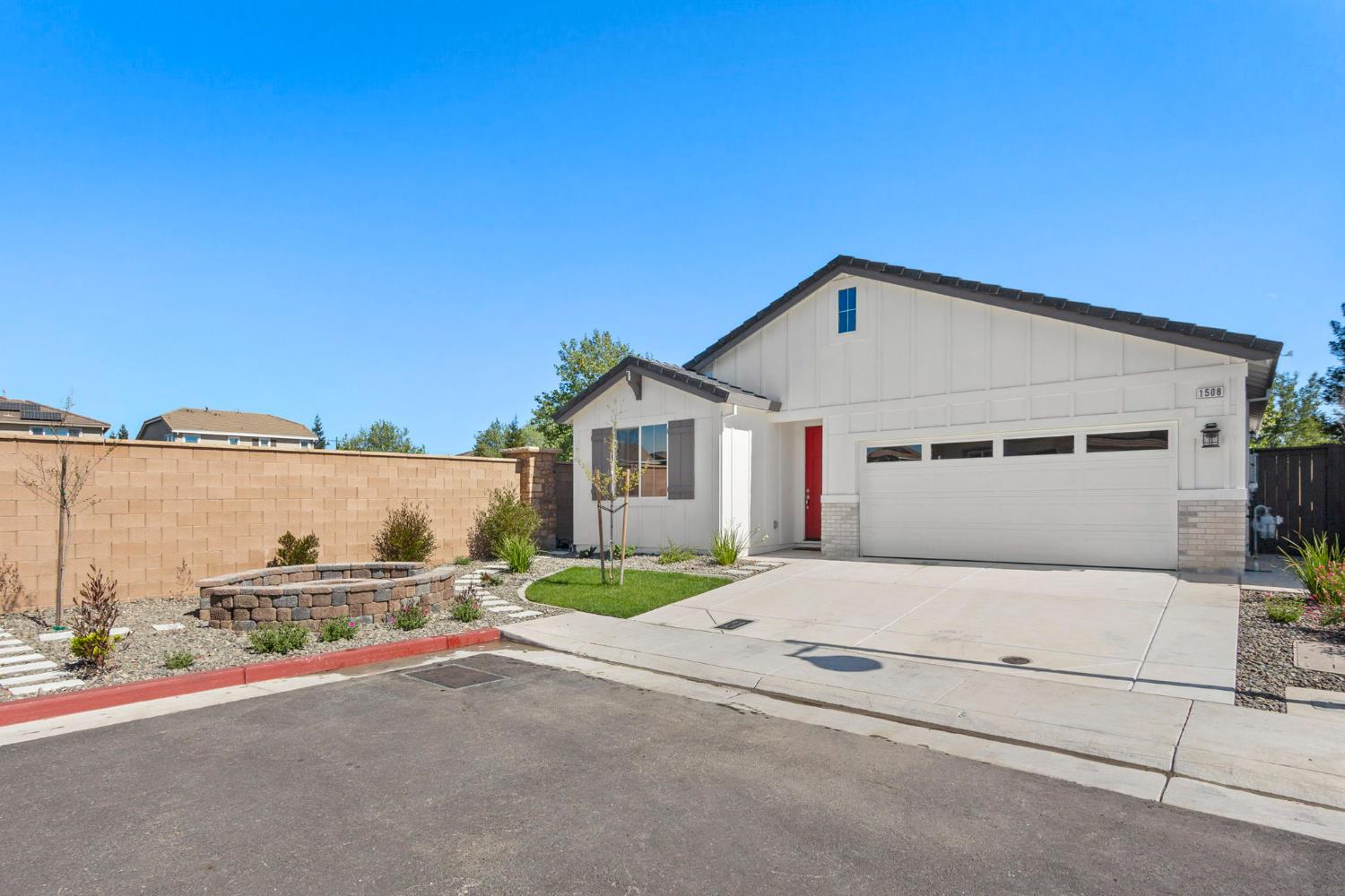 1508 Westwind Way Rocklin, CA 95765 - Photo 2 of 45 a front view of a house with a yard