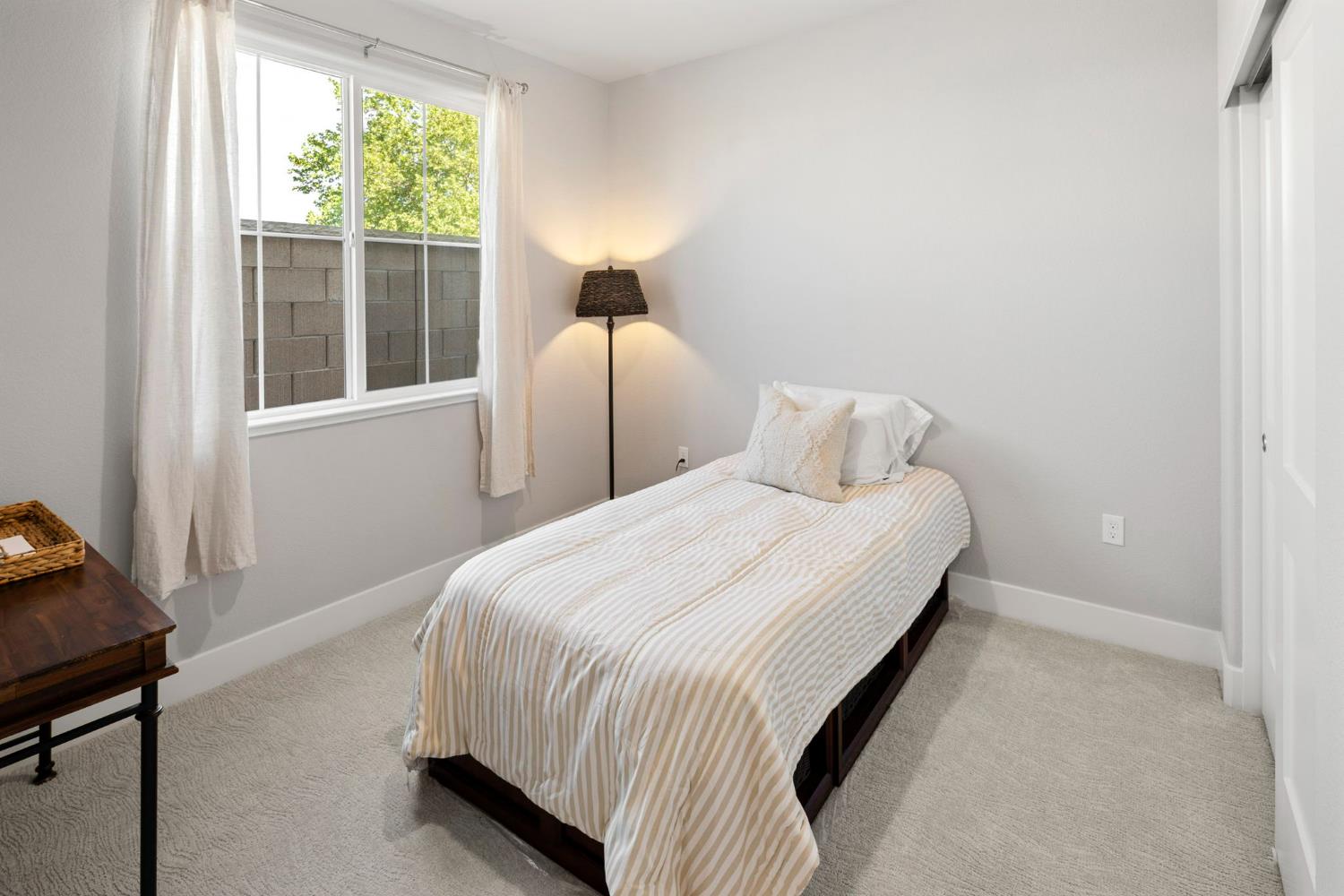 1508 Westwind Way Rocklin, CA 95765 - Photo 22 of 45 a bedroom with a bed and window