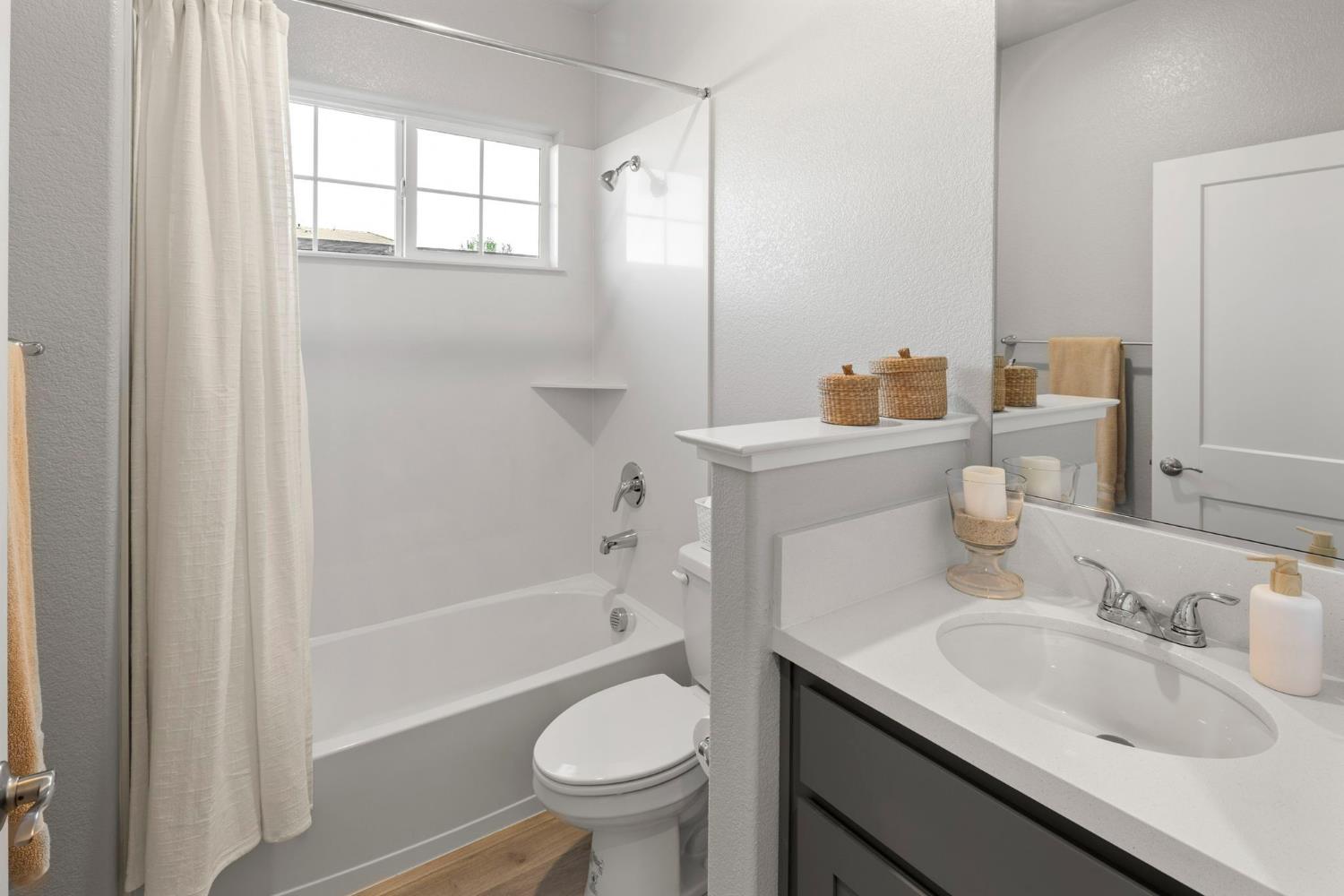 1508 Westwind Way Rocklin, CA 95765 - Photo 24 of 45 a bathroom with a sink toilet and shower