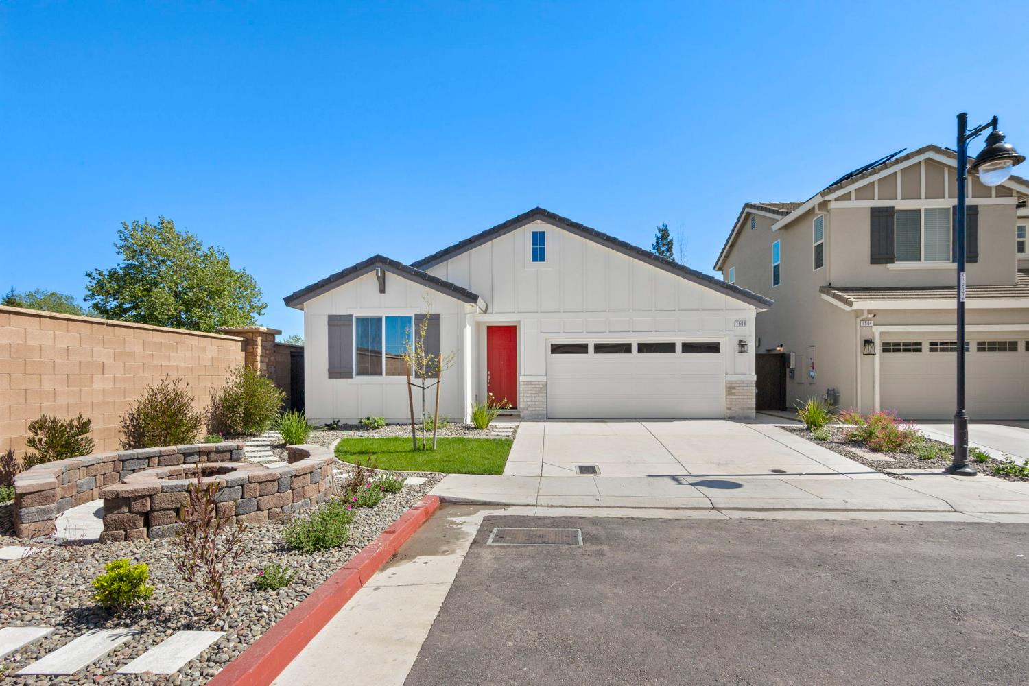 1508 Westwind Way Rocklin, CA 95765 - Photo 35 of 45 a front view of a house with a yard and garage