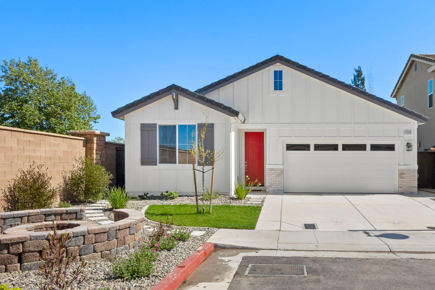 1508 Westwind Way Rocklin, CA 95765 - Photo 4 of 45 a front view of a house with a yard