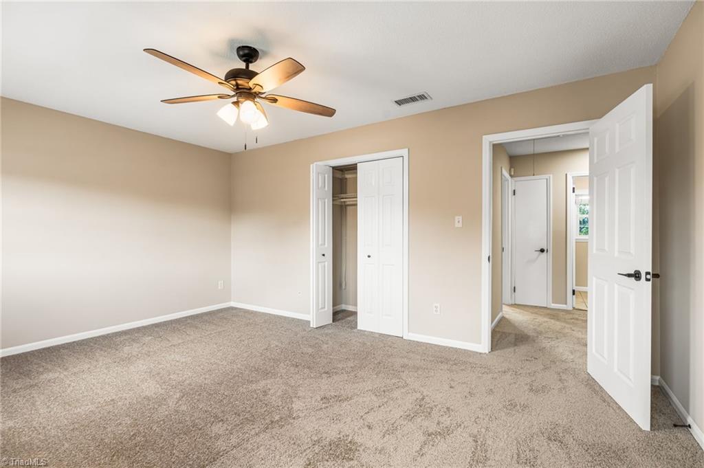 1827 Johnson Street, Unit A High Point, NC 27262 - Photo 18 of 29 Primary bedroom with two closets