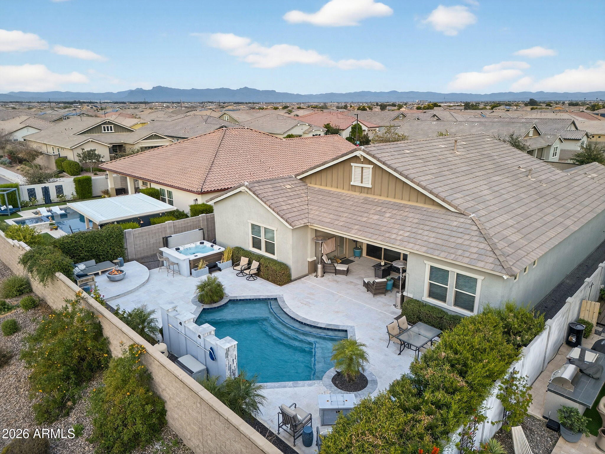 an aerial view of a house with beach