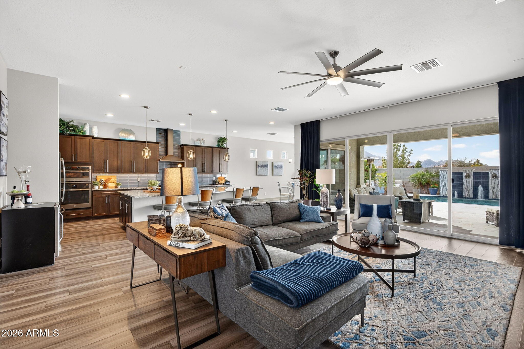 35112 North Jacobs Road San Tan Valley, AZ 85144 - Photo 11 of 80 a living room with furniture and a large window