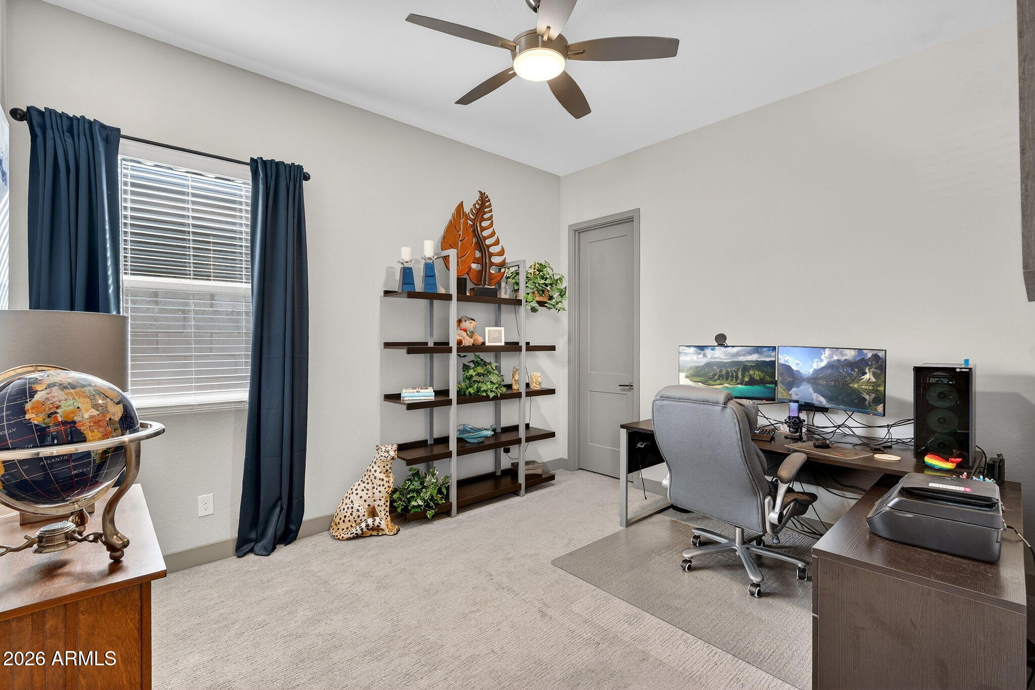 35112 North Jacobs Road San Tan Valley, AZ 85144 - Photo 28 of 80 a view of a workspace with furniture and a window