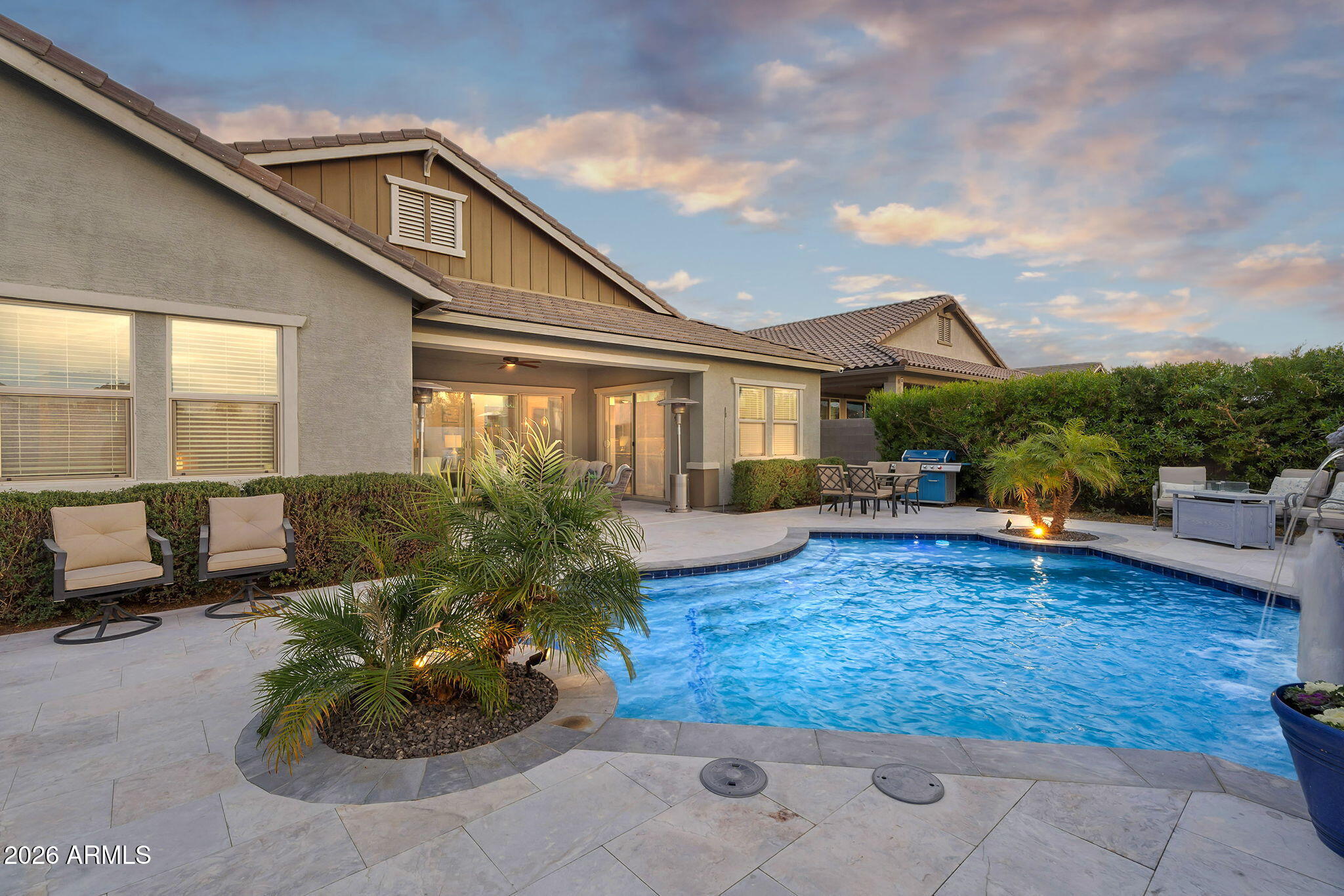 35112 North Jacobs Road San Tan Valley, AZ 85144 - Photo 3 of 80 a view of a house with backyard and sitting area