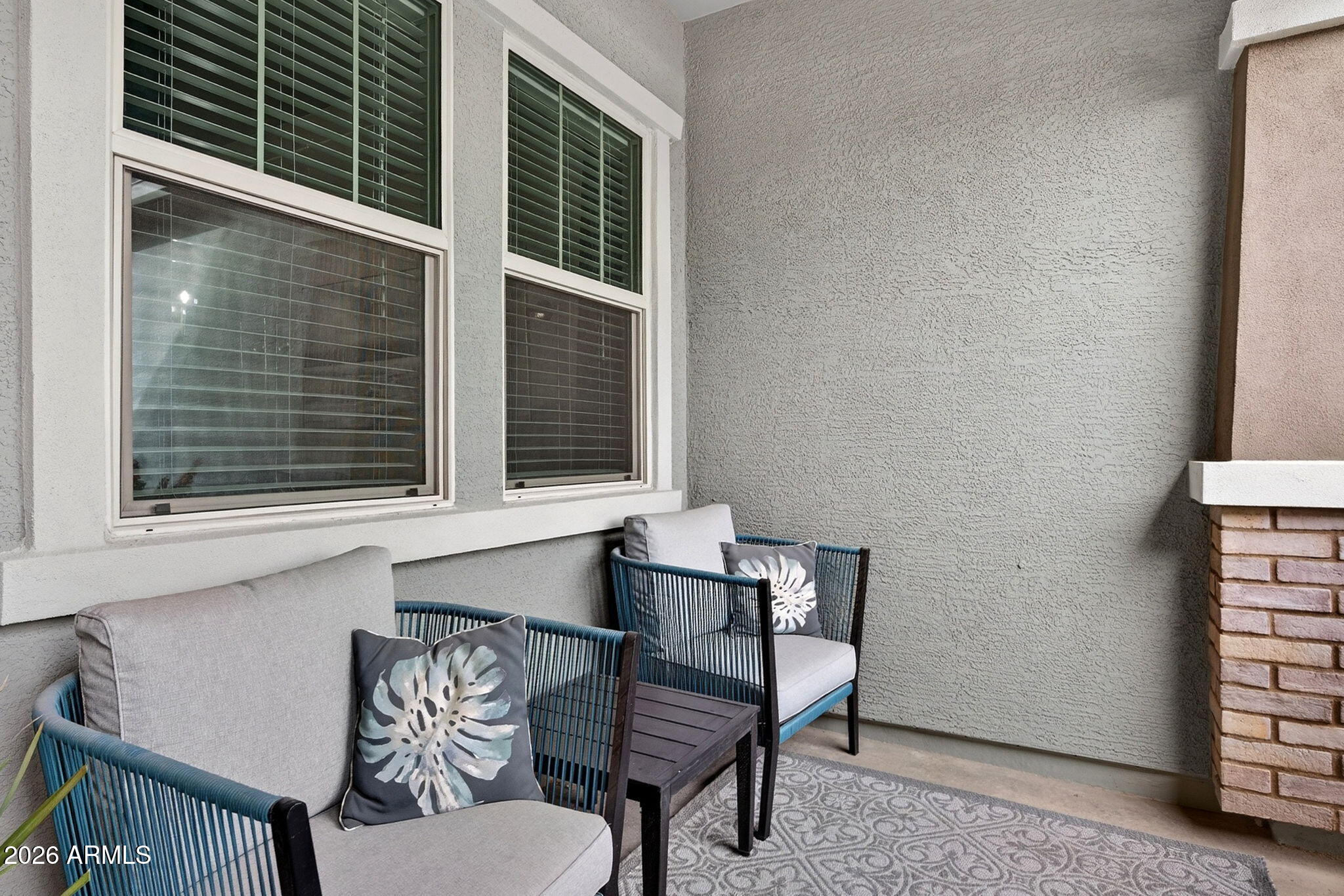35112 North Jacobs Road San Tan Valley, AZ 85144 - Photo 9 of 80 a balcony with table and chairs