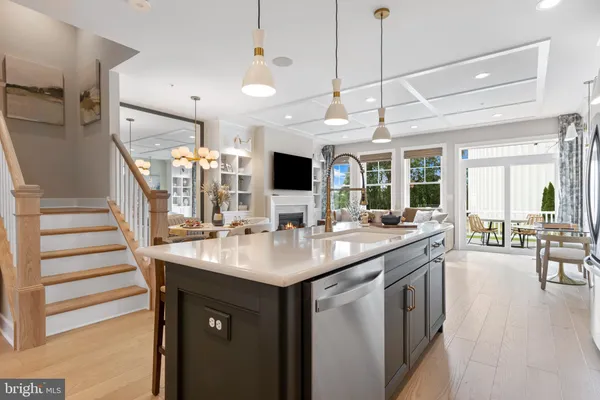 a kitchen with a sink and stove