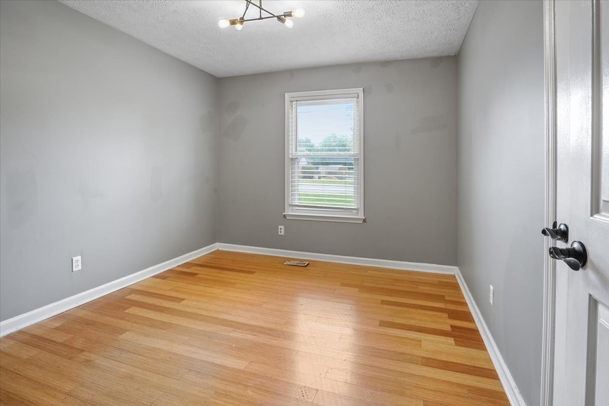 1306 Cason Trail Murfreesboro, TN 37128 - Photo 23 of 38 a view of a room with a wooden floor and a window