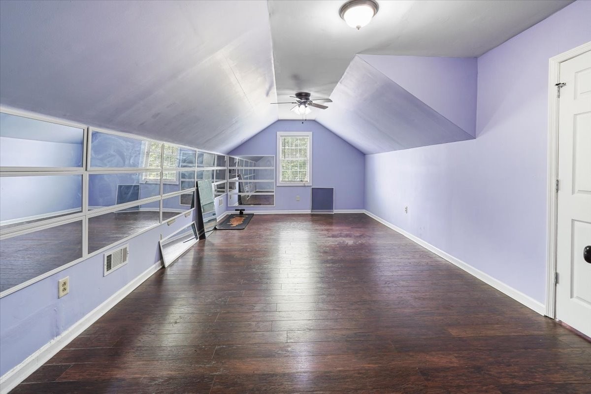 1306 Cason Trail Murfreesboro, TN 37128 - Photo 28 of 38 a view of an empty room with a window and wooden floor