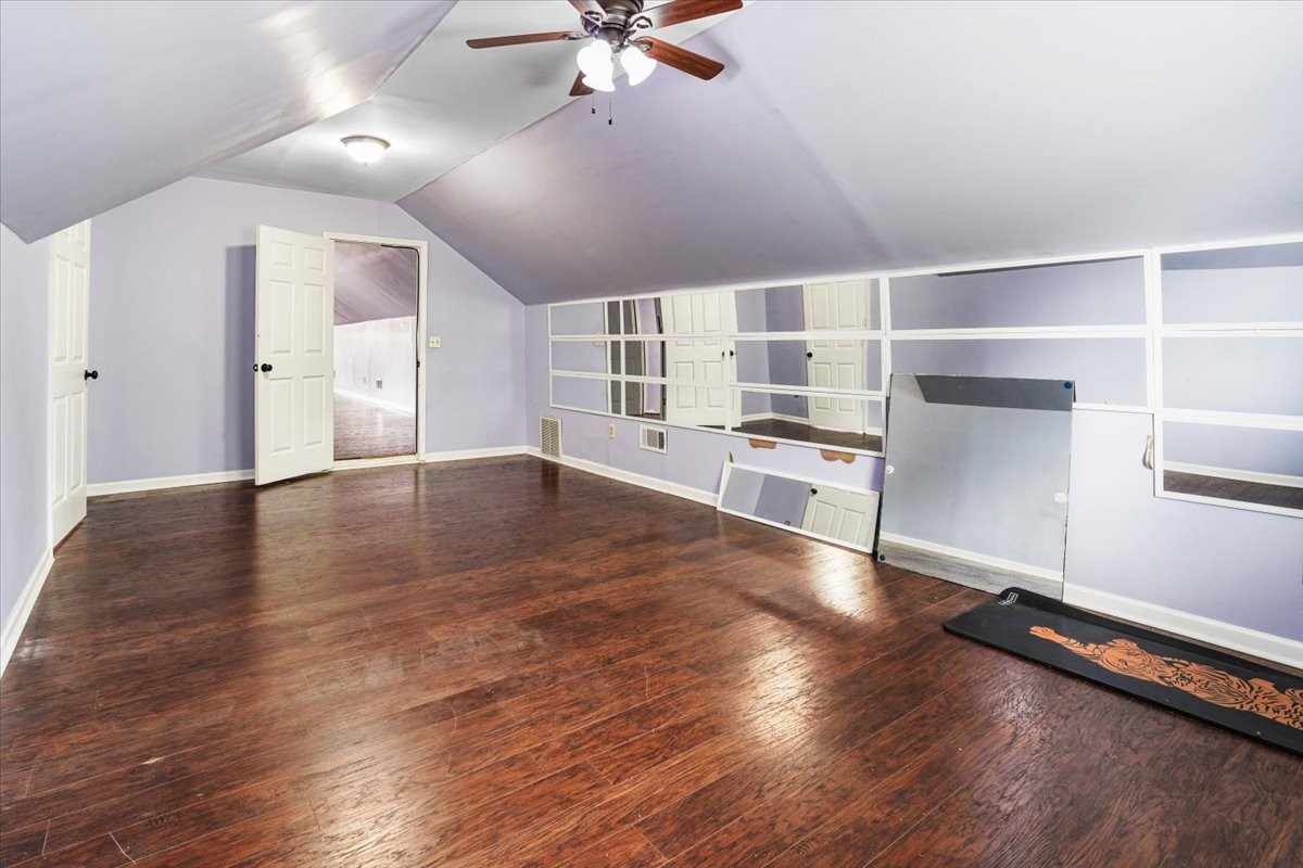 1306 Cason Trail Murfreesboro, TN 37128 - Photo 29 of 38 wooden floor in an empty room with a window