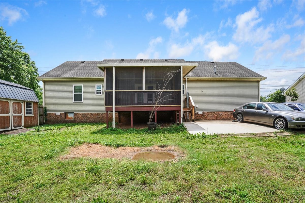 1306 Cason Trail Murfreesboro, TN 37128 - Photo 32 of 38 a view of a house with backyard