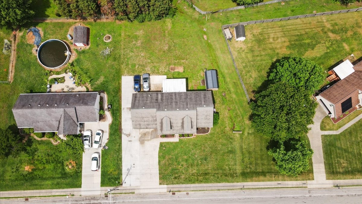 1306 Cason Trail Murfreesboro, TN 37128 - Photo 37 of 38 an aerial view of a house with garden space and street view