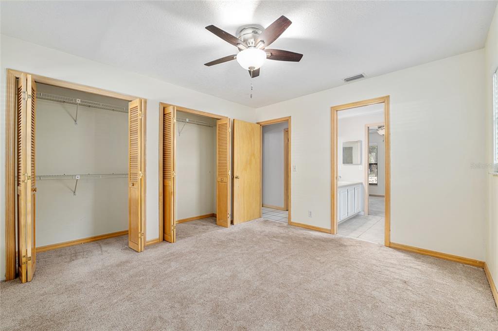 2023 Southwest 76 Terrace Gainesville, FL 32607 - Photo 21 of 95 a view of an empty room with a ceiling fan