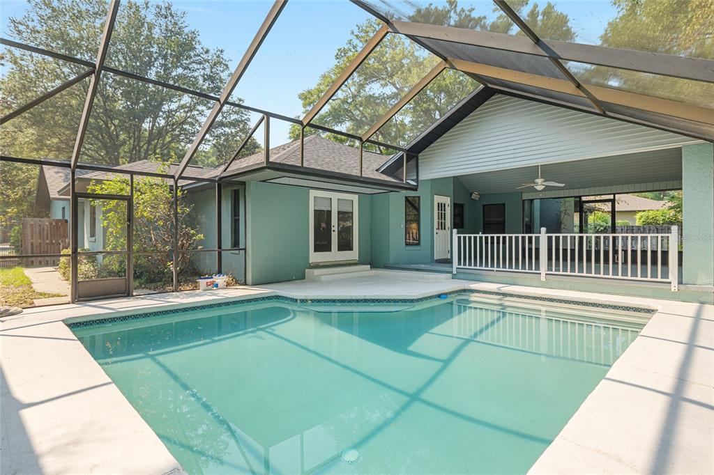 2023 Southwest 76 Terrace Gainesville, FL 32607 - Photo 3 of 95 a view of a house with a backyard and a patio