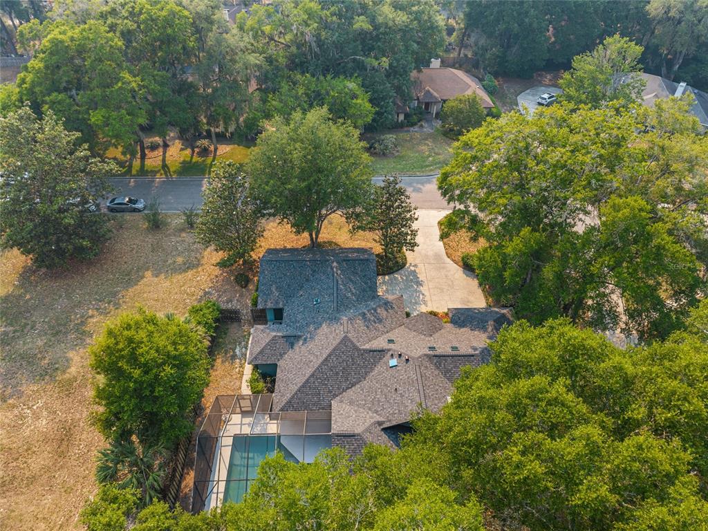 2023 Southwest 76 Terrace Gainesville, FL 32607 - Photo 84 of 95 an aerial view of a house with yard