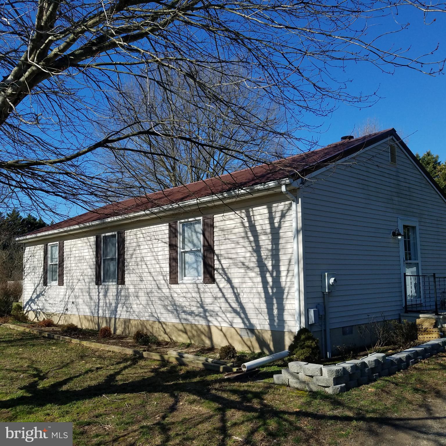 5460 Bethlehem Road Preston, MD 21655 - Photo 1 of 25 a view of backyard with wooden fence