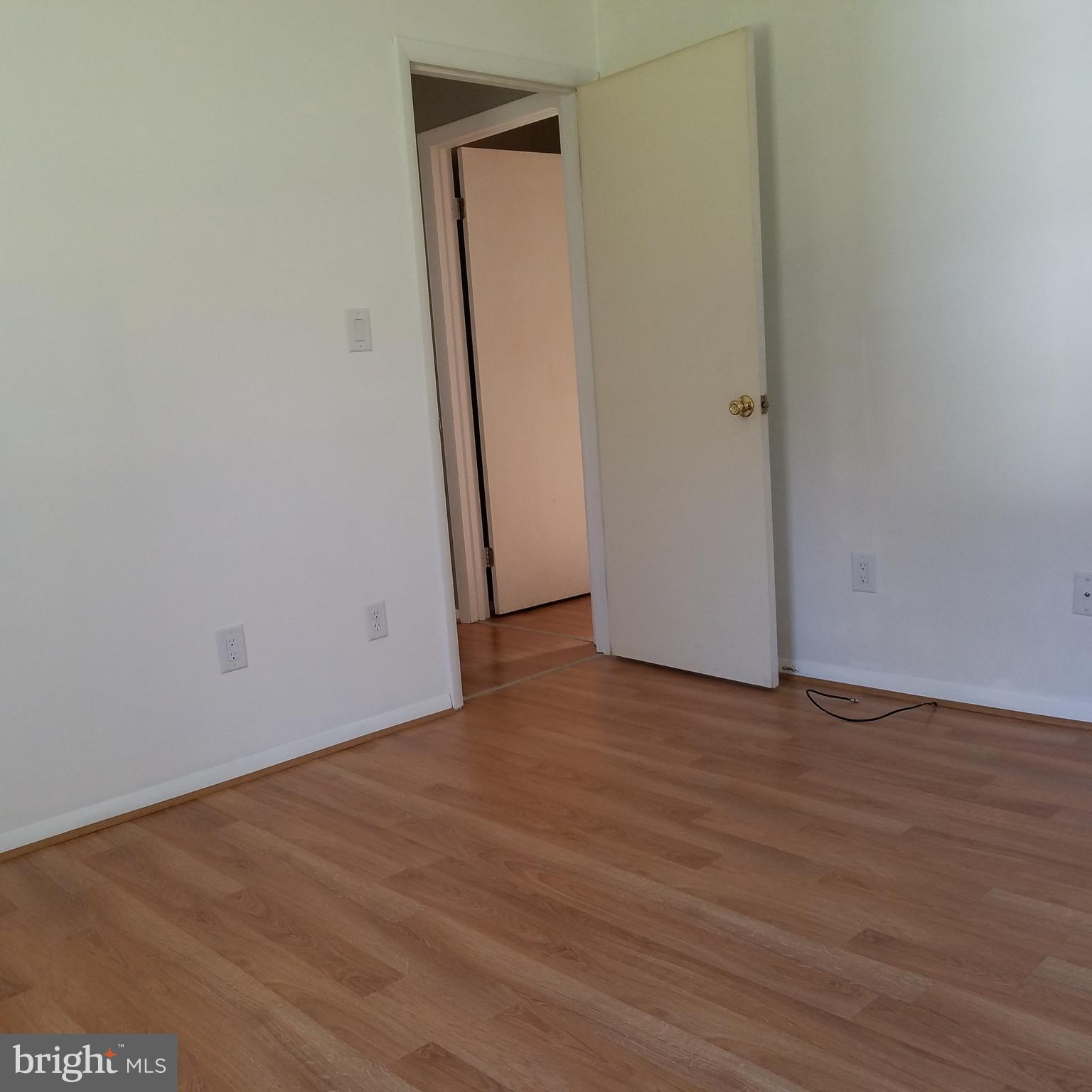 5460 Bethlehem Road Preston, MD 21655 - Photo 13 of 25 a view of a room with wooden floor