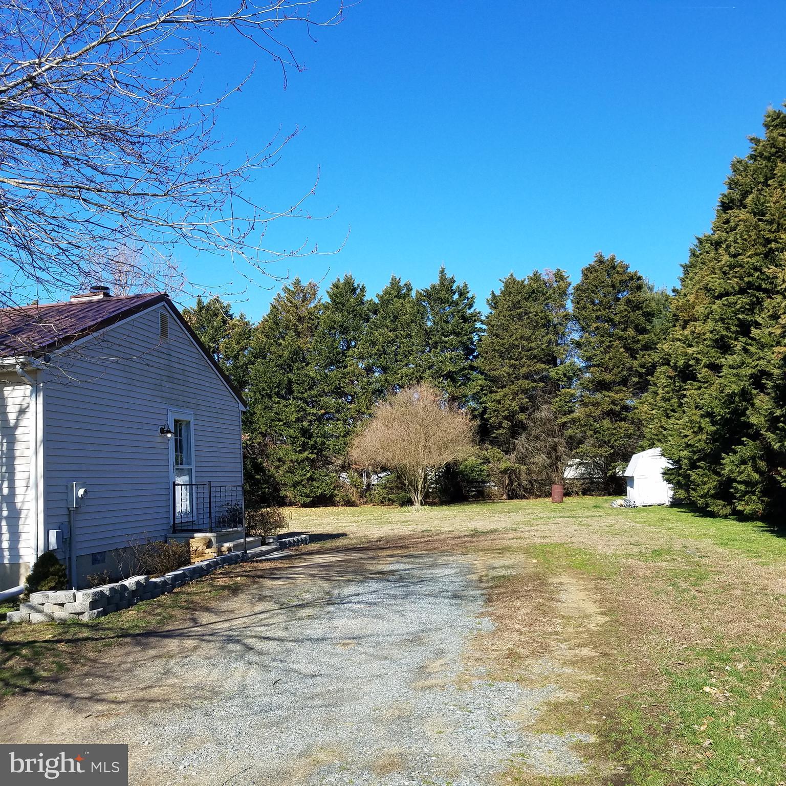 5460 Bethlehem Road Preston, MD 21655 - Photo 23 of 25 a view of a house with a yard